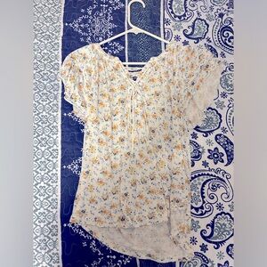 Women’s size small shirt.